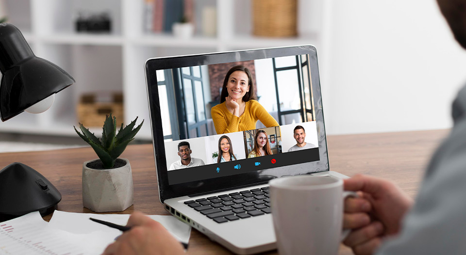 Videocall. five persons doing a digital meeting.